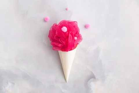Bath sponge in cornet colourful fluffy balls creative concept Stock-Fotos