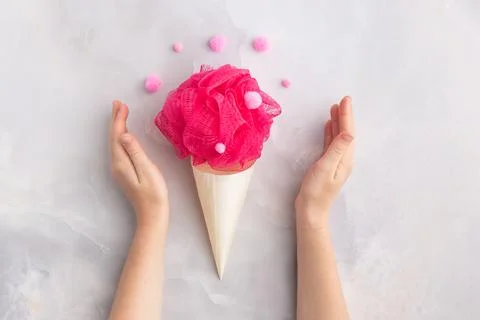 Bath sponge in cornet colourful fluffy balls creative concept Stock Photos