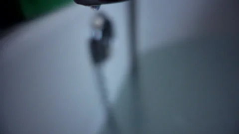 Bath tap drip slo mo Stock Footage 138030775