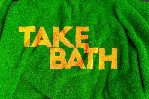 The bath text word on the towel texture, the clean spa body care concept desi Фото