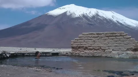 Bath in thermal spring in the andes mountains Stock Footage 20454019