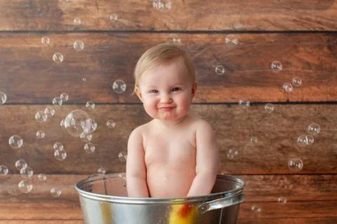 Bath time photo shoot. Stock Photos