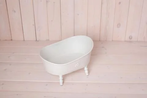 Bath on a wooden background. Stock Photos