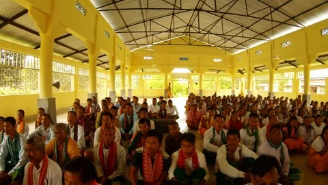 Bathau tribe in beautiful clothes in a new spacious rural temple dedicated to th Stock Footage 113279457