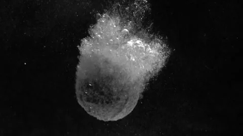Bathbomb Falls Against Black Backdrop Stock Footage 300890556