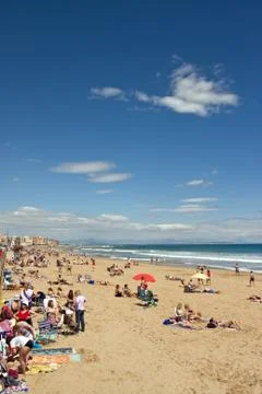 Bathers at a beach Stock Photos