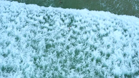 Bathers dive in the sea waves. Stock Footage 159535814