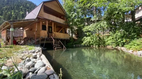 Bathhouse with pond Video stock 144868841