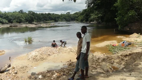Bathing and laundry on river - boys posing Stock Footage 111037350