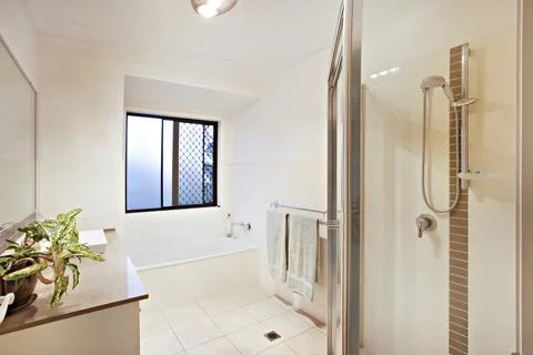 Bathing area with big wall mirror Stock Photos