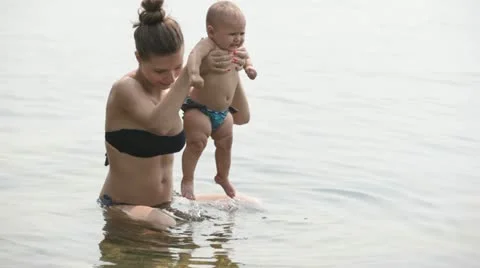 Bathing the baby Stock Footage 11357960