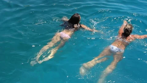 Bathing in blue lagoon Stock Footage 7753656