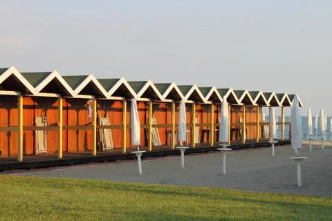 Bathing boxes on a beach Stock Photos