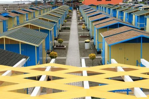 Bathing boxes on the beach Stock Photos