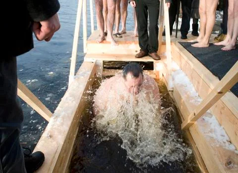 Bathing in the consecrated water of the river Daugava in Riga (Latvia). Stock Photos