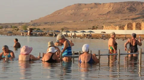 Bathing in Dead Sea Stock Footage 911879