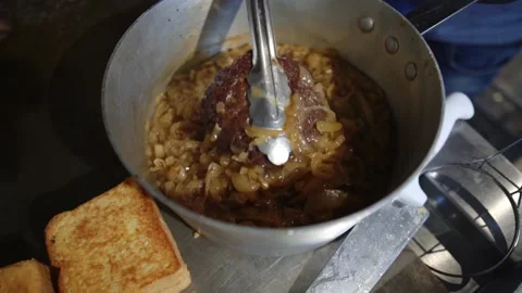 Bathing A Hamburger In Pork Sauce Stock Footage 197056505