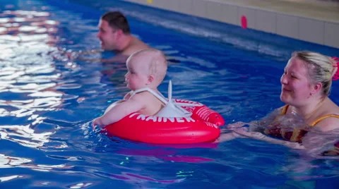Bathing with mother in swimming pool Video stock 54076801