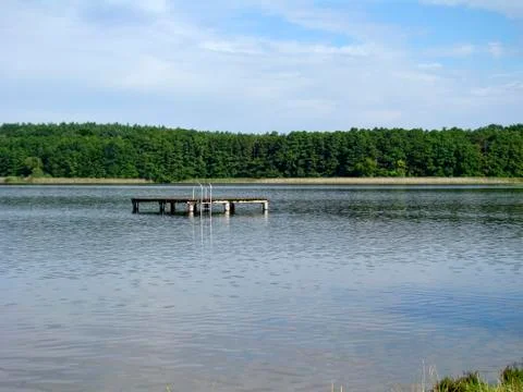Bathing platform on a lake Stock Photos