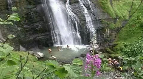 Bathing in a waterfall Stock-Footage 10573379