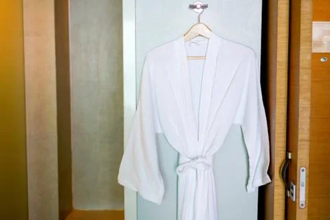 Bathrobe in the hotel bathroom Stock Photos