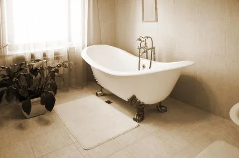 Bathroom with a beautiful bath Stock Photos