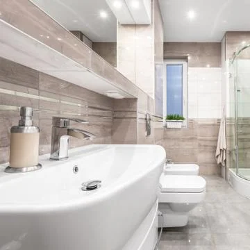 Bathroom in beige Stock Photos