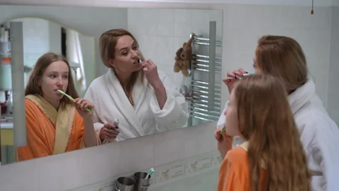 Bathroom that captures the special bond between mother and daughter Stock Footage 295423772