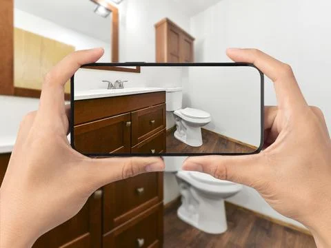 Bathroom with cell phone Stock Photos