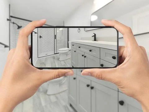 Bathroom with cell phone Stock Photos