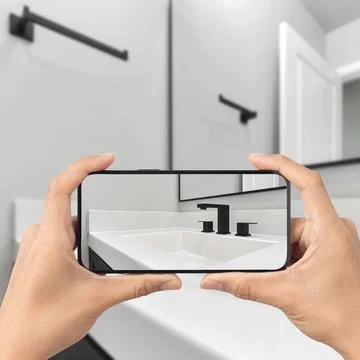 Bathroom with cell phone Stock Photos