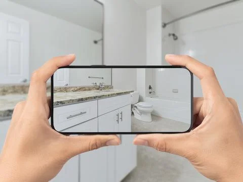 Bathroom with cell phone Stock Photos