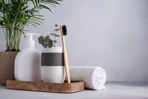 Bathroom composition with bamboo toothbrushes. Eco friendly bodycare concept. Stock Photos