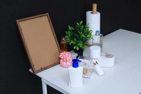 Bathroom counter essentials with decorative elements and personal care items Stock Photos