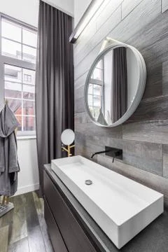 Bathroom with countertop basin Stock Photos