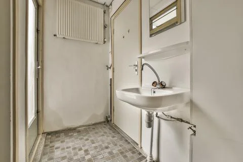 A bathroom in a cozy house Stock Photos