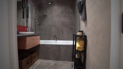Bathroom dark porcelain with red ceramic white bath Stock Footage 125892834