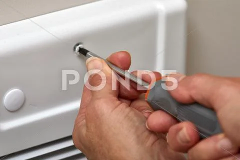 Bathroom fan repair. Stock Photos