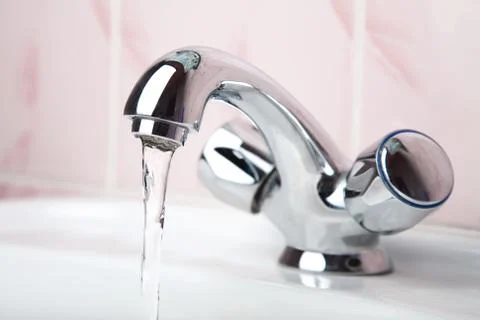 Bathroom faucet Stock Photos