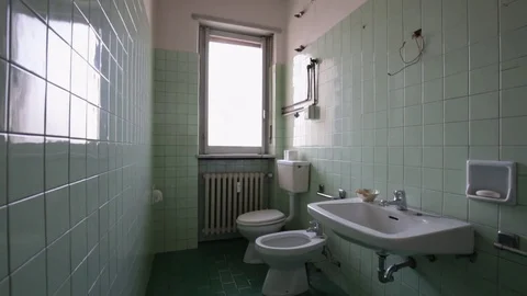Bathroom with green tiles, empty room Video stock 72343352