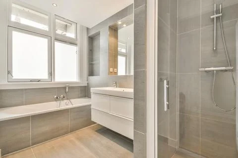 Bathroom in grey design Stock Photos