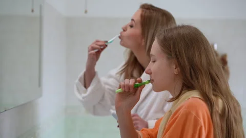 Bathroom A Heartwarming Bonding Experience Between Mother and Daughter Stock Footage 295423531