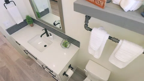 Bathroom High Angle Looking Down Rising Above Vanity and Shelf Stock Footage 244173411