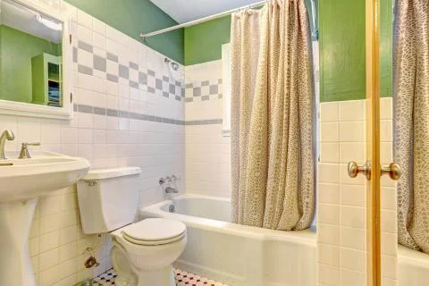 Bathroom inteiror with tile wall trim Stock Photos