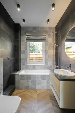 Bathroom interior bathtub round mirror Photos