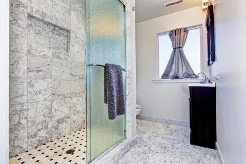 Bathroom interior in granite tile Stock Photos