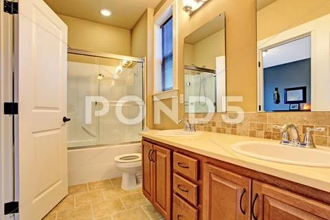 Bathroom interior with screened bath tub Stock Photos