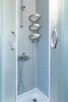 Bathroom interior with shower cabin Stock Photos