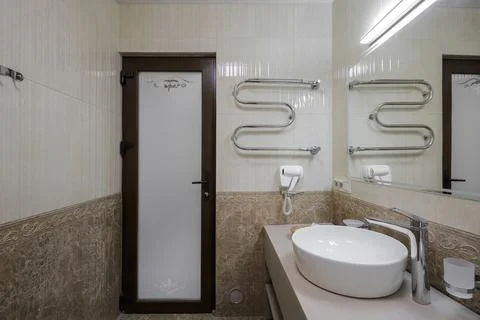 Bathroom interior with sink and mirror Stock Photos