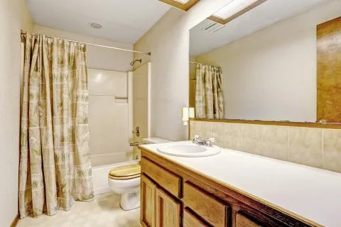 Bathroom with large mirror Stock Photos